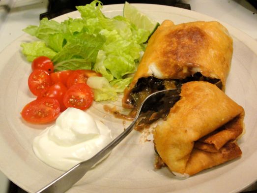 Chimichanga filled with black beans, peppers, and cheese