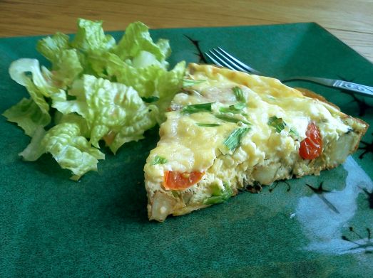 Vegetable frittata and romaine lettuce with oil and vinegar.