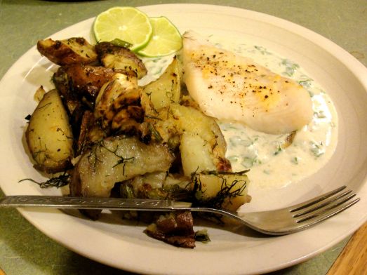 Pangasius fillet with roasted fennel and potatoes and fresh cilantro yogurt sauce