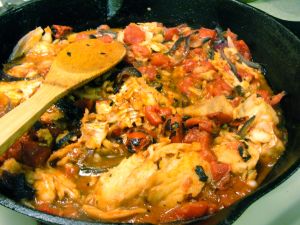 Alaskan cod with tomatoes and onion