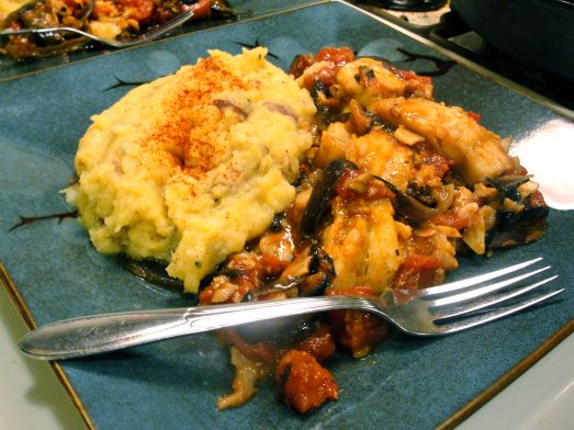 Cod with tomatoes and onions accompanied by mashed acorn squash