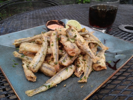 Friend smelts, tossed with garlic and cilantro leaf.